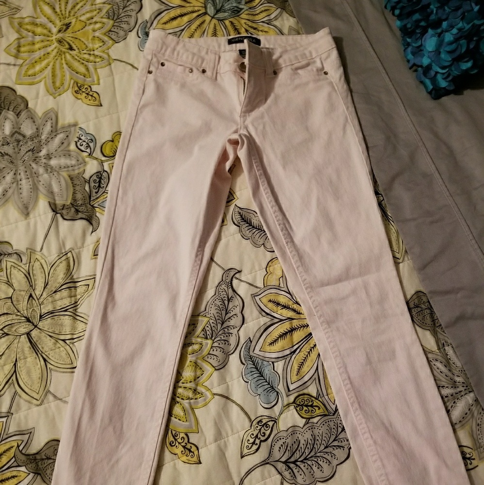 Pale pink skinny jeans